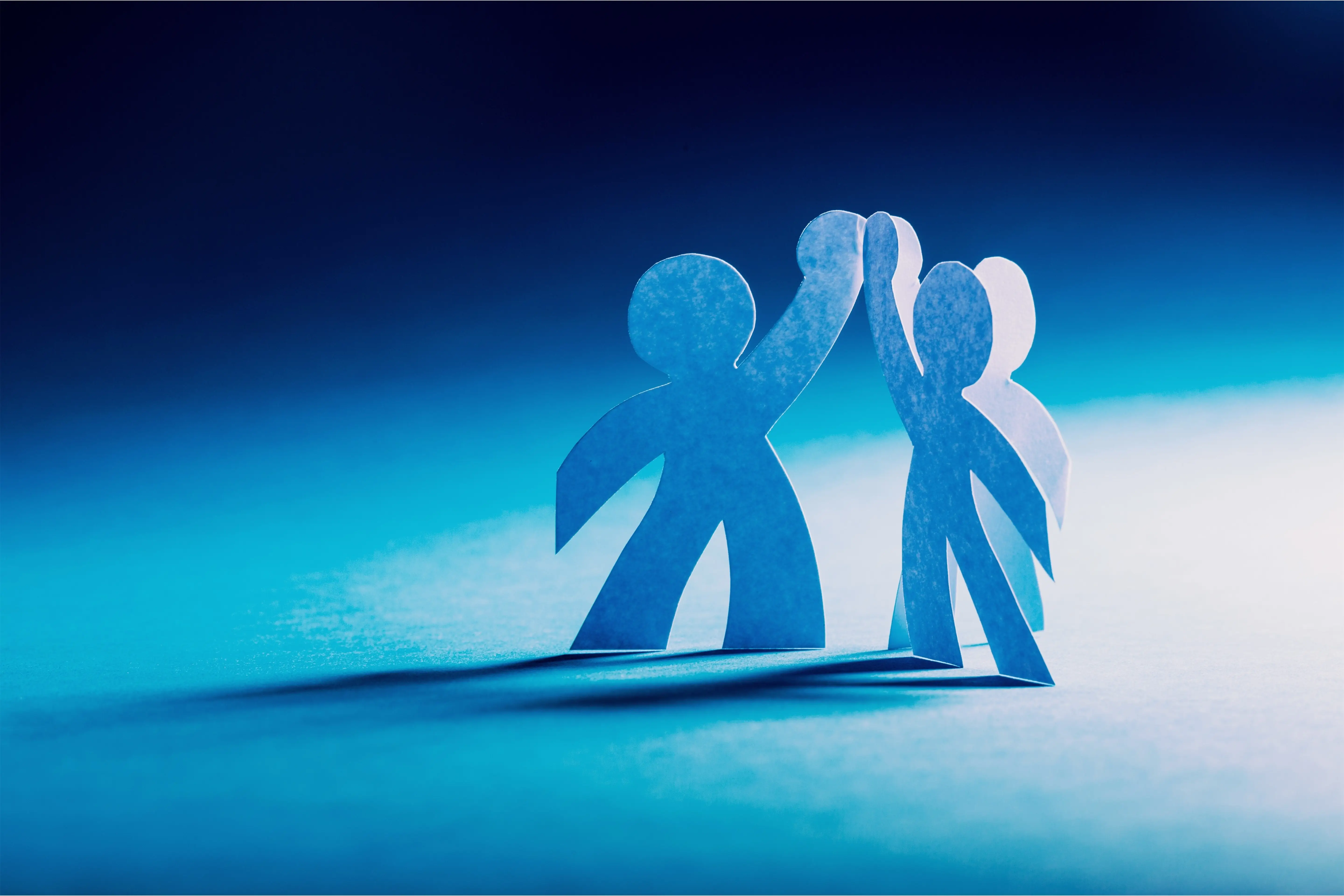 /images/blog/paper-people-circle-holding-hands (1).webp